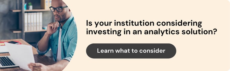 ID: On the left is a photo of a man in an office, sitting at his desk and thoughtfully reading over his notes. On the right text reads: "Is your institution considering investing in an analytics solution? Learn what to consider.